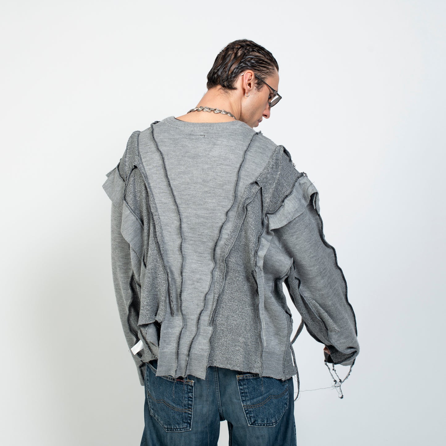DECONSTRUCTED KNIT ° REUSE WEAR °   1 OF 1